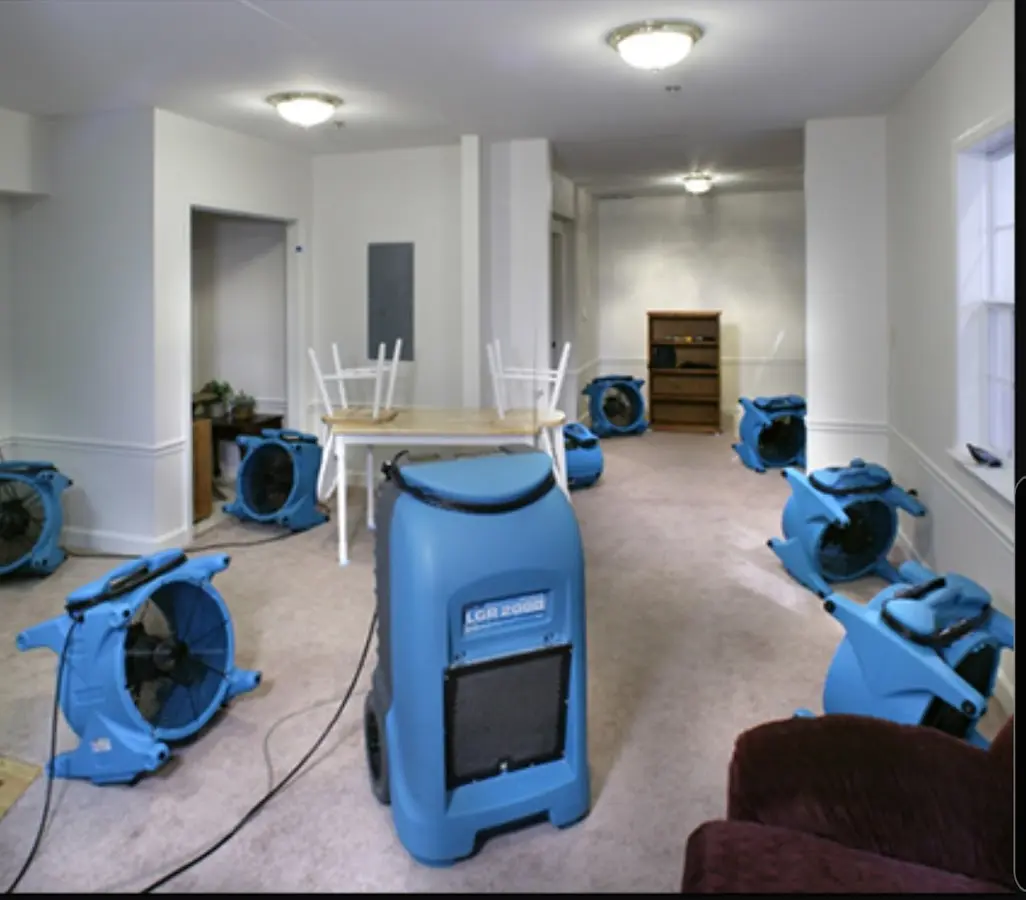 Air movers and dehumidifier setup for Water Damage Restoration in Verona